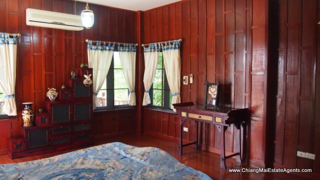 Traditional Lanna Style Home in Modern Moo Baan