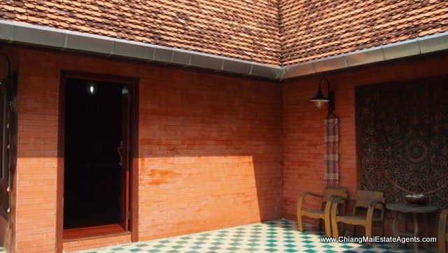 Traditional Lanna Style Home in Modern Moo Baan