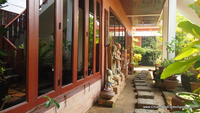 Traditional Lanna Style Home in Modern Moo Baan