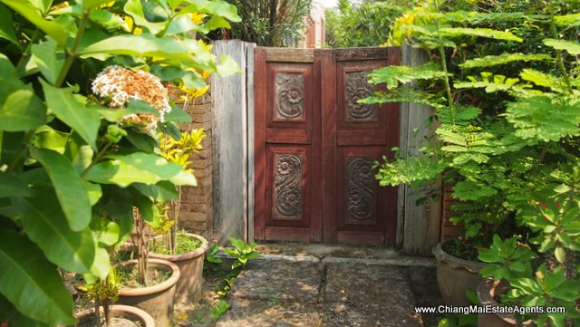 Traditional Lanna Style Home in Modern Moo Baan